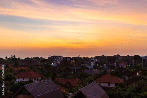 Sunset over Seminyak district with colorful landscape background. Bali island, Indonesia. © umike_foto