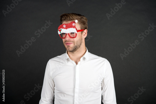 things will wait. businessman in funny santa glasses. corporate party concept. business office party celebration. handsome man party glasses. santa come for xmas. merry christmas. happy new year