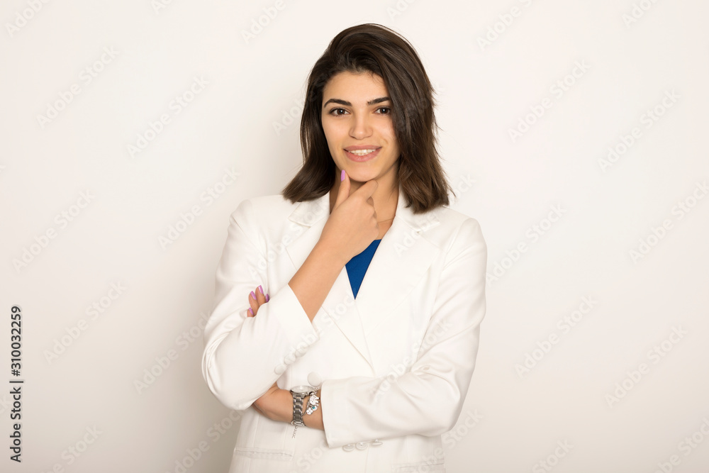 Portrait of young beautiful business woman on white background. Portrait of young beautiful business woman on white background.