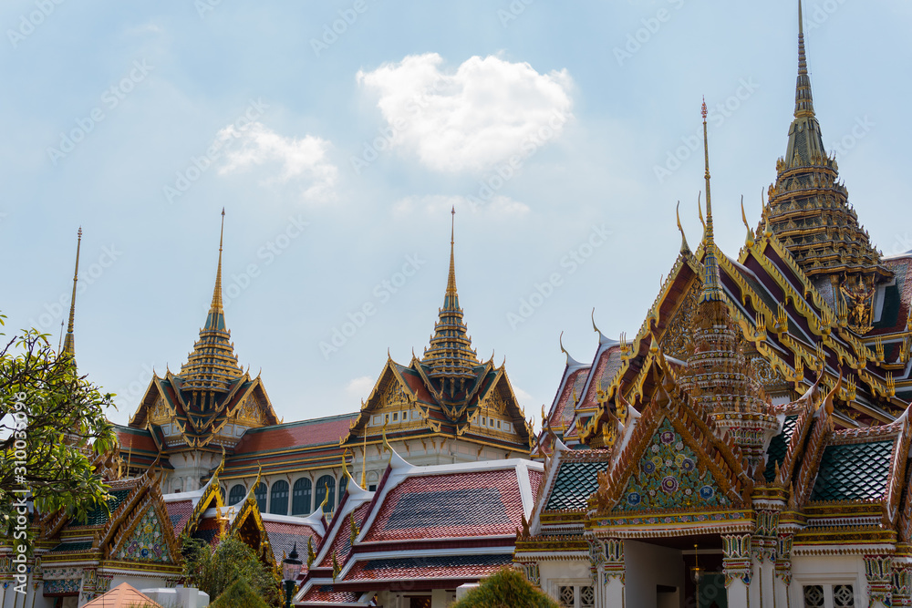 Tipical thai architecture in one of the most important buildings of the Grand Palace, the old thai king's residence, located in Bangkok, Thailand Tipical thai architecture in one of the most important buildings of the Grand Palace, the old thai king's residence, located in Bangkok, Thailand