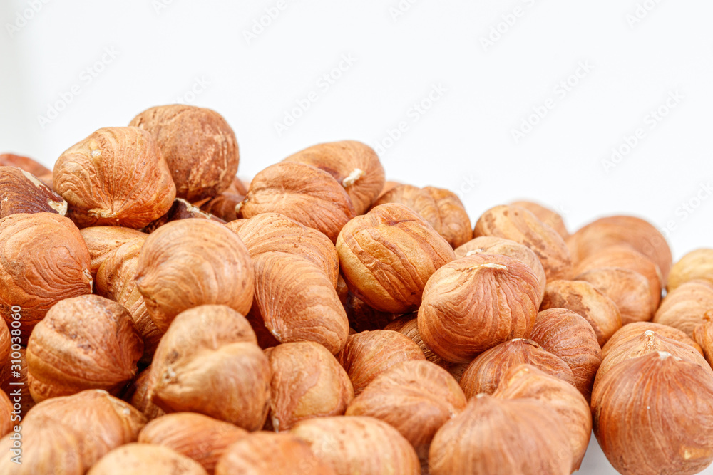 macro hazelnuts nuts on a white background macro hazelnuts nuts on a white background
