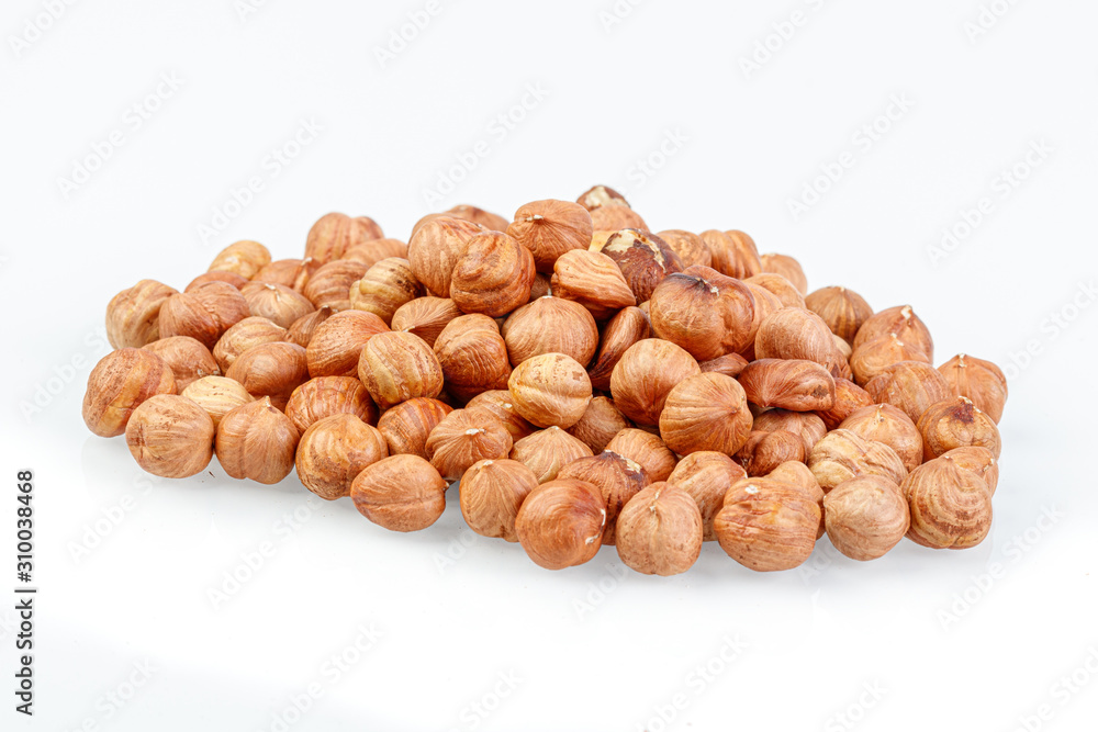 macro hazelnuts nuts on a white background macro hazelnuts nuts on a white background