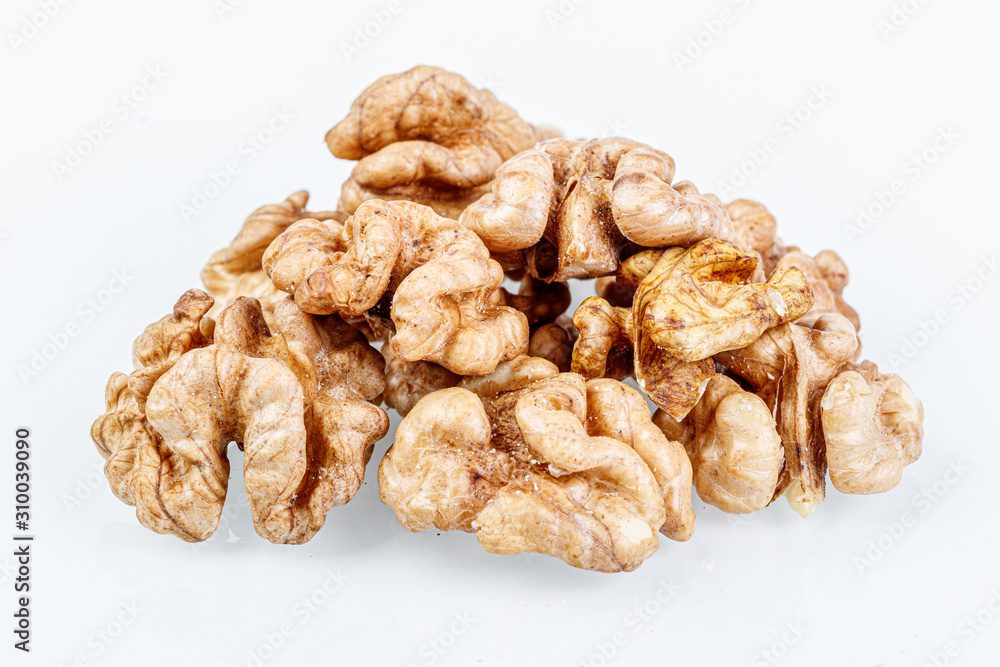 macro juglandaceae nuts, walnut on a white background macro juglandaceae nuts, walnut on a white background