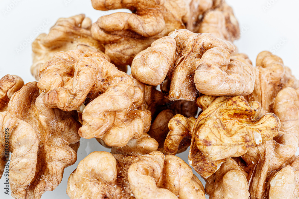 macro juglandaceae nuts, walnut on a white background macro juglandaceae nuts, walnut on a white background