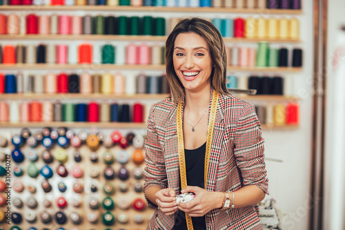 Konstfotografi Portrait of happy dressmaker woman in studio