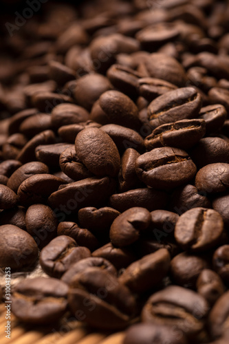 Coffee beans close-up. Vertical picture.