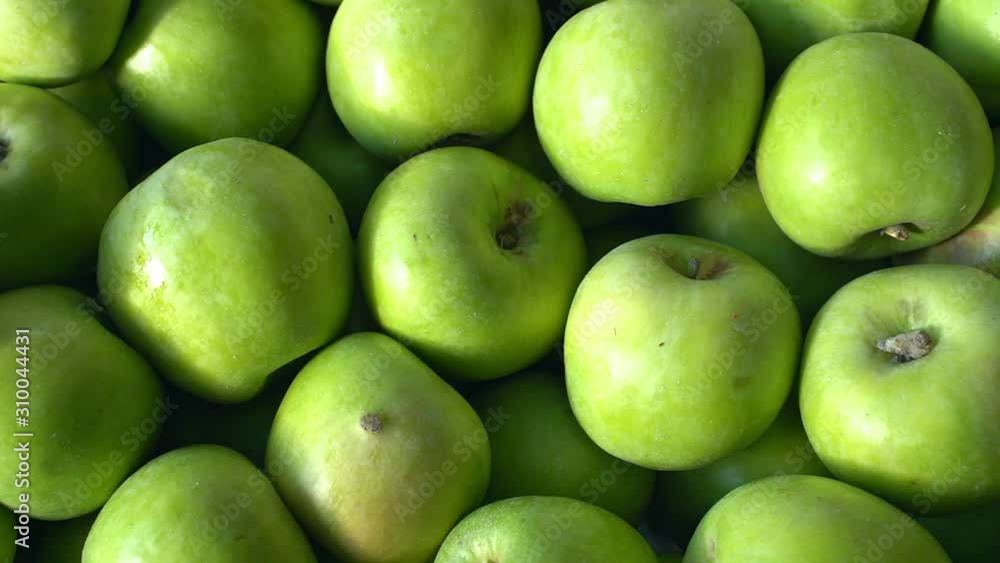 green apples on black background green apples on black background