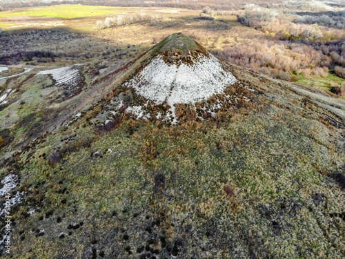 Distant view of chalk butte hill in autumn photo