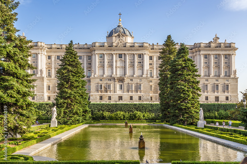 Madrid, Spain. Fountain in the gardens of Sabatini on the background of the royal palace