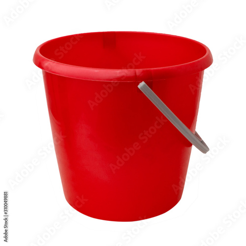 New, classic, plastic bucket. Red bucket isolated on a white background.