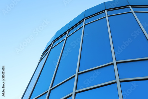 Modern building with tinted windows outdoors. low angle view