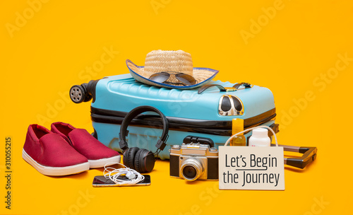 Blue suitcase luggage and travelingl banner with causal shoe, holidays concept