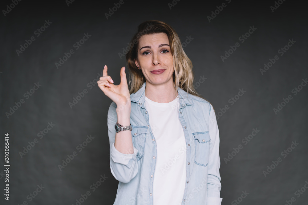 Woman showing length on fingers Woman showing length on fingers