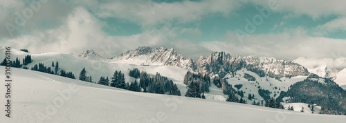 Magical winter atmosphere with panoramic view of the Swiss Alps