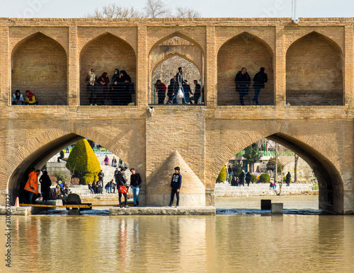 Isfahan, Iran - 2 February 2019: Si-o-seh pol Bridge. Also known as Allahverdi Khan and Allahverdi Khan or 33 arched bridge over the Zayandeh river.