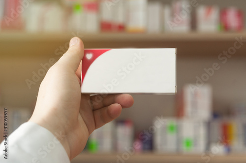 medicine in the hand of a pharmacist