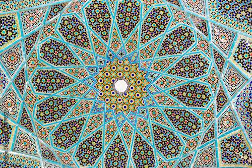 Shiraz, Iran - 31 January 2019: Geometric ceiling decoration of the tomb of popular iranian poet Hafez.