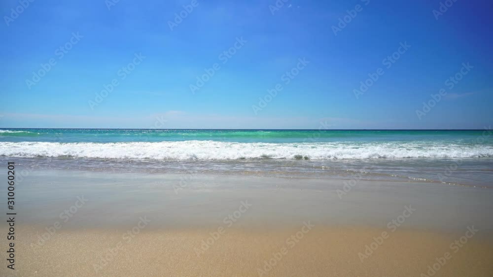 Beautiful tropical beach with blue sky and white cloud background. Summer vacation and nature environment concept. Beautiful tropical beach with blue sky and white cloud background. Summer vacation and nature environment concept.