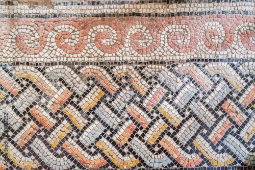 Old colored mosaic floor in Roman Catholic church Dominus Flevit. Fragment, details. Jerusalem, Israel