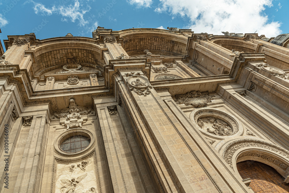 Facade of the historic Cathedral of Granada in Spain. South West front of Santa Maria de la Encarnacion Cathedral