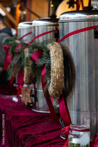 Mulled wine heaters with christmas decorations on christmas market in Poznan, Poland.