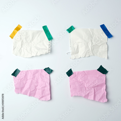 blank crumpled sheets of paper glued with rubber colored adhesive tape