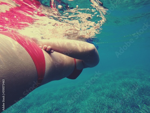 Scopello, Castellammare del Golfo, Trapani. Snorkeling in the incredible Spiaggia dei Faraglioni.