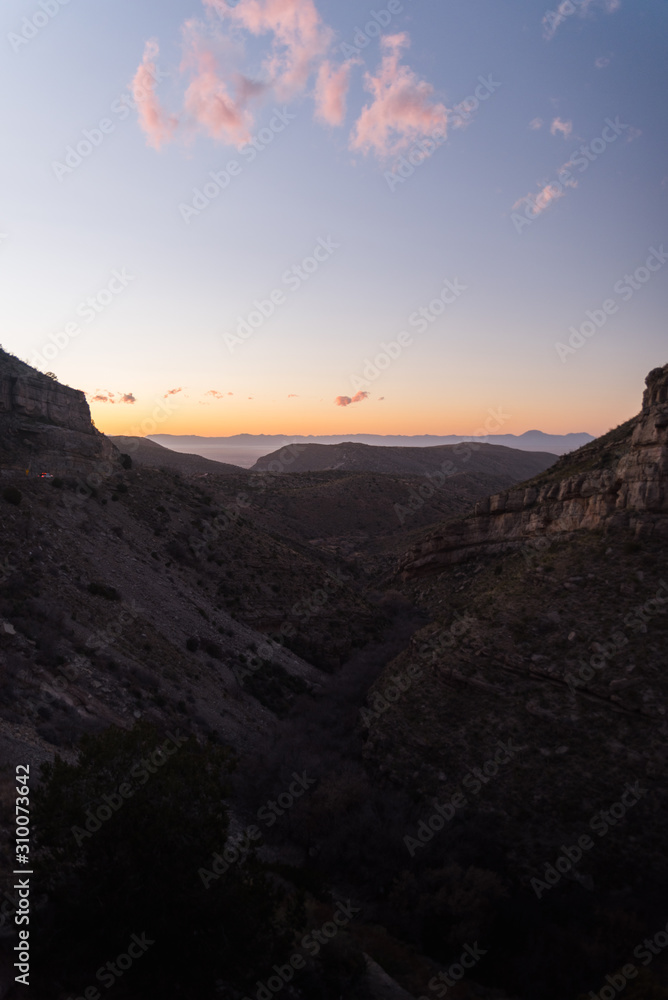Fototapeta premium Sunset, landscape view over mountains in southern New Mexico.