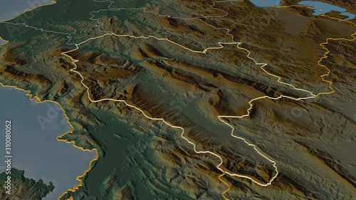 Gjirokastër, county with its capital, zoomed and extruded on the relief map of Albania in the conformal Stereographic projection. Animation 3D