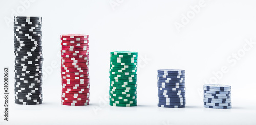 Poker chips on a white background different stacks of isolate