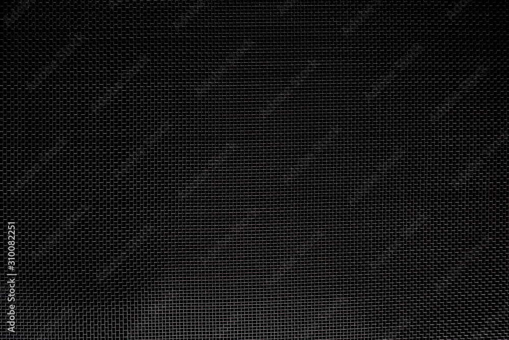 Texture of diagonal and rectangular metal lattice fine weave lattice on black background Texture of diagonal and rectangular metal lattice fine weave lattice on black background