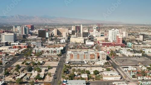 Aerial sideways dolly shot of downtown Las Vegas in the daytime, left to right