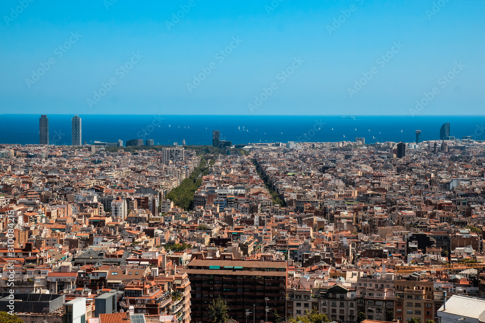 Panoramic view of Barcelona and the sea on a sunny summer day