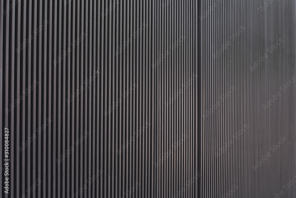 metal wall with vertical gray bars metal wall with vertical gray bars