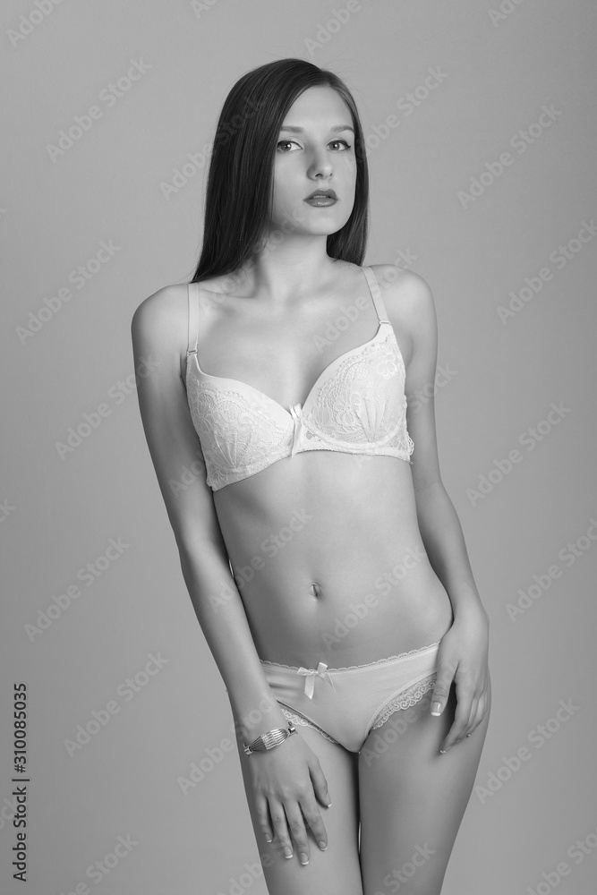 Fototapeta premium Sexy woman in white lingerie gorgeous figure.