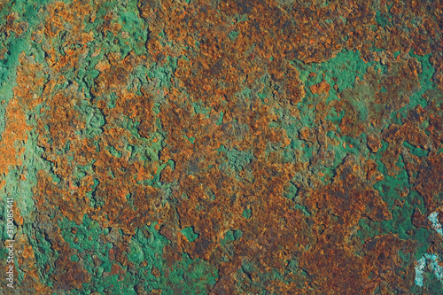 Industrial rusty metal background texture with peeling green paint © Koxae