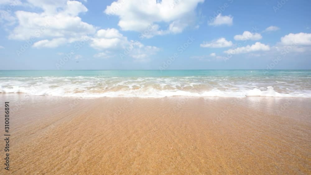 Phuket beach sea, Slow motion of beach sea on sun light in the summer. At Maikao Beach, Phuket, Thailand.  Freedom travel concept.  Prores FHD, Video Clip.