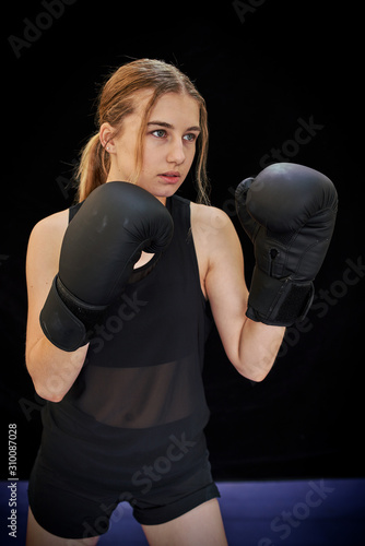 young female keeping fit boxing © ian