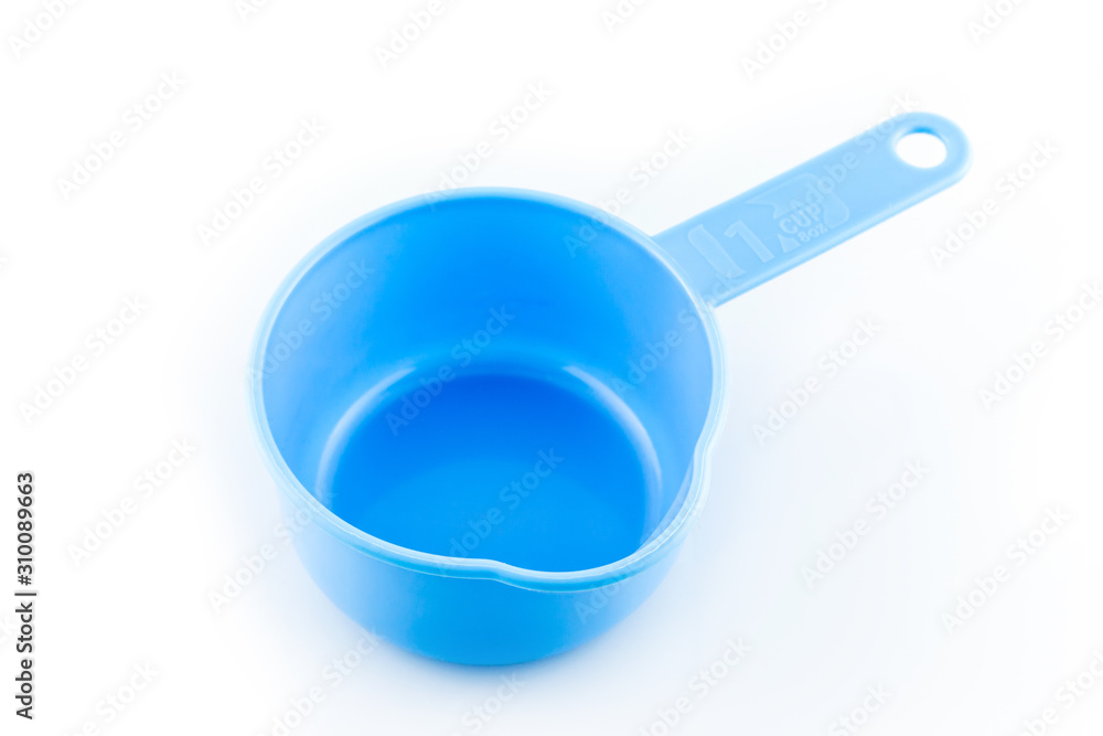 measuring spoon of plastic on white background. measuring spoon of plastic on white background.