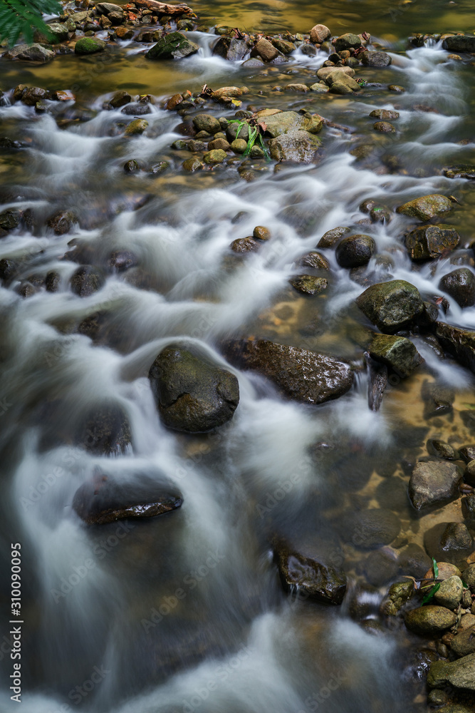 water flowing over rocks water flowing over rocks