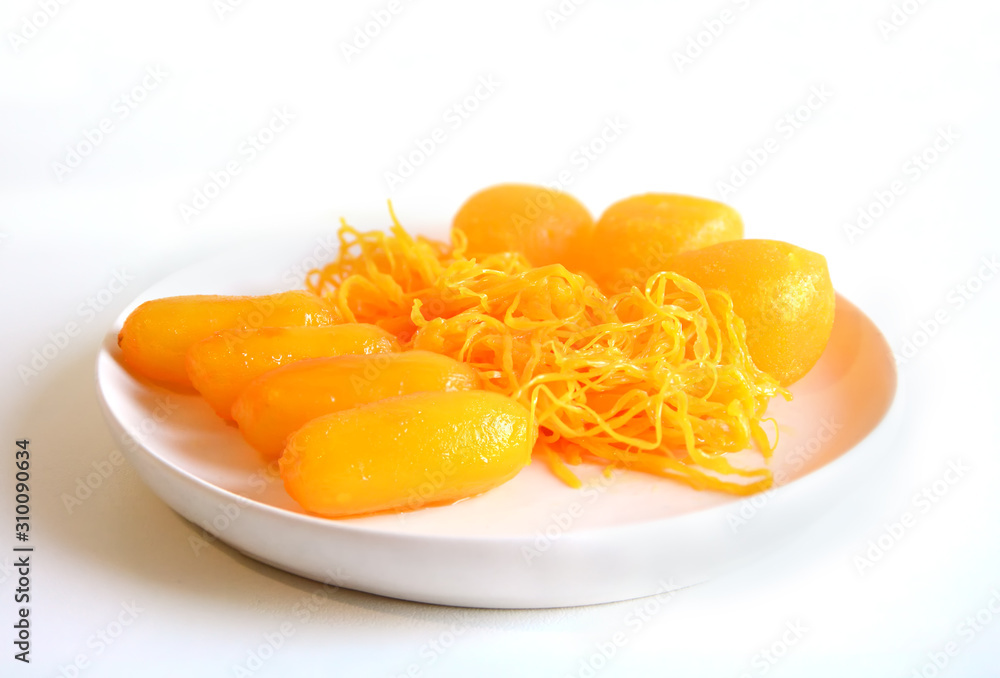 golden threads or foi thong or dessert made from egg yolks or Golden Egg strips or Swing blonded-hair golden threads or foi thong or dessert made from egg yolks or Golden Egg strips or Swing blonded-hair