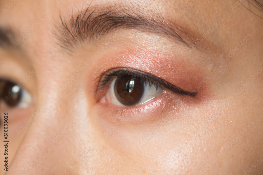 Fototapeta premium Asian women eyes staring at a distance object, with selective focus