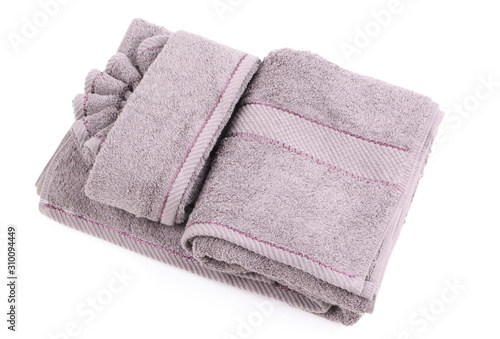 Set of grey bathroom towels on white background