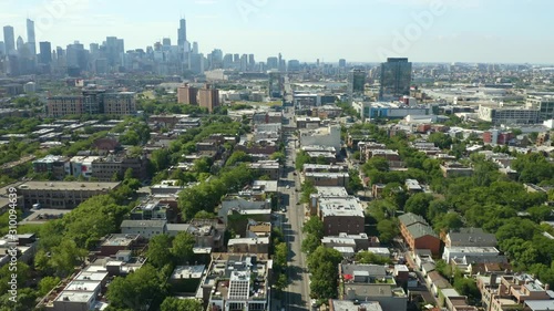 Cars Driving on Urban Street during Summer photo