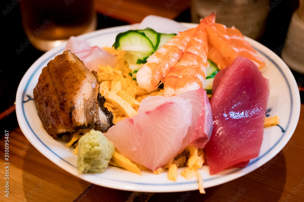 An assortment of gorgeous sliced raw fish An assortment of gorgeous sliced raw fish