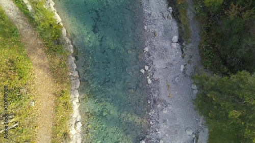 Wallpaper Mural drone ascending fast above a colourful mountainstream Torontodigital.ca