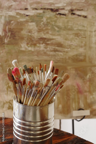 Artist Paint Brushes. Used kit paint brushes in can. Close-up. Great art background.