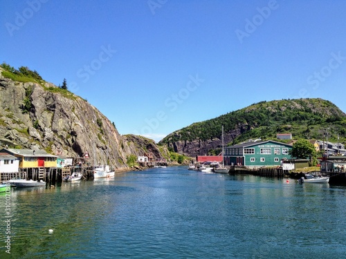 An interesting view of the small fishing village and local brewery of Quidi Vidi, just outside St. John's Newfoundland and Labrador, Canada photo