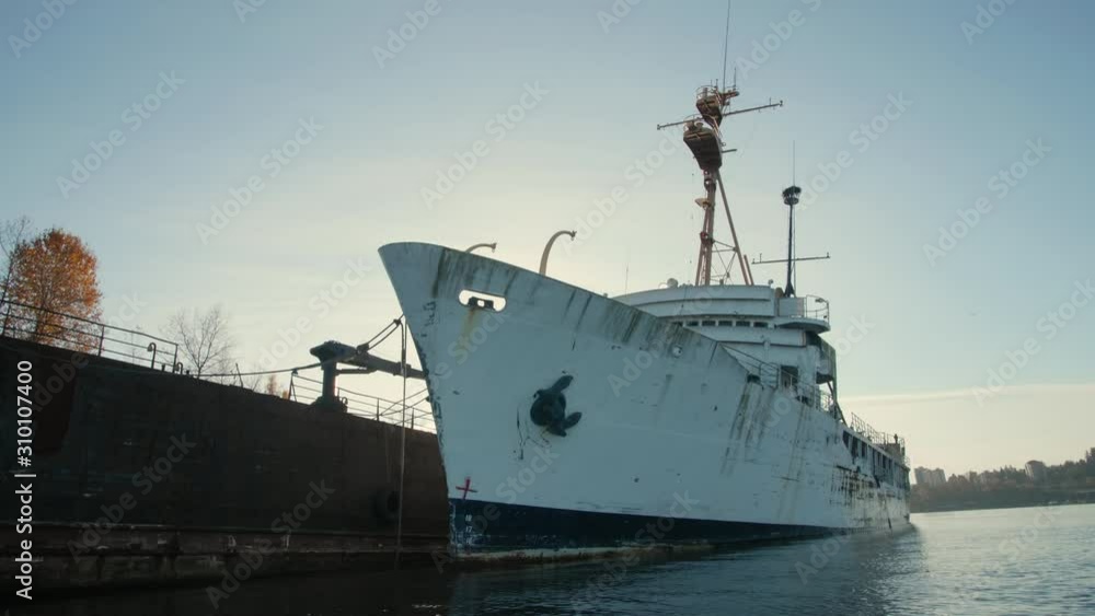 Abandoned Scrap Metal White Ship with Sun Flare Abandoned Scrap Metal White Ship with Sun Flare
