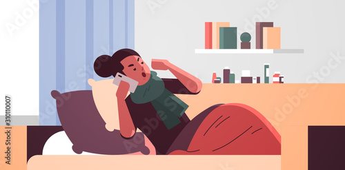 sick woman having sneeze unhealthy girl in scarf calling phone for medical help suffering from cold flu virus illness concept modern living room interior flat full length closeup horizontal vector